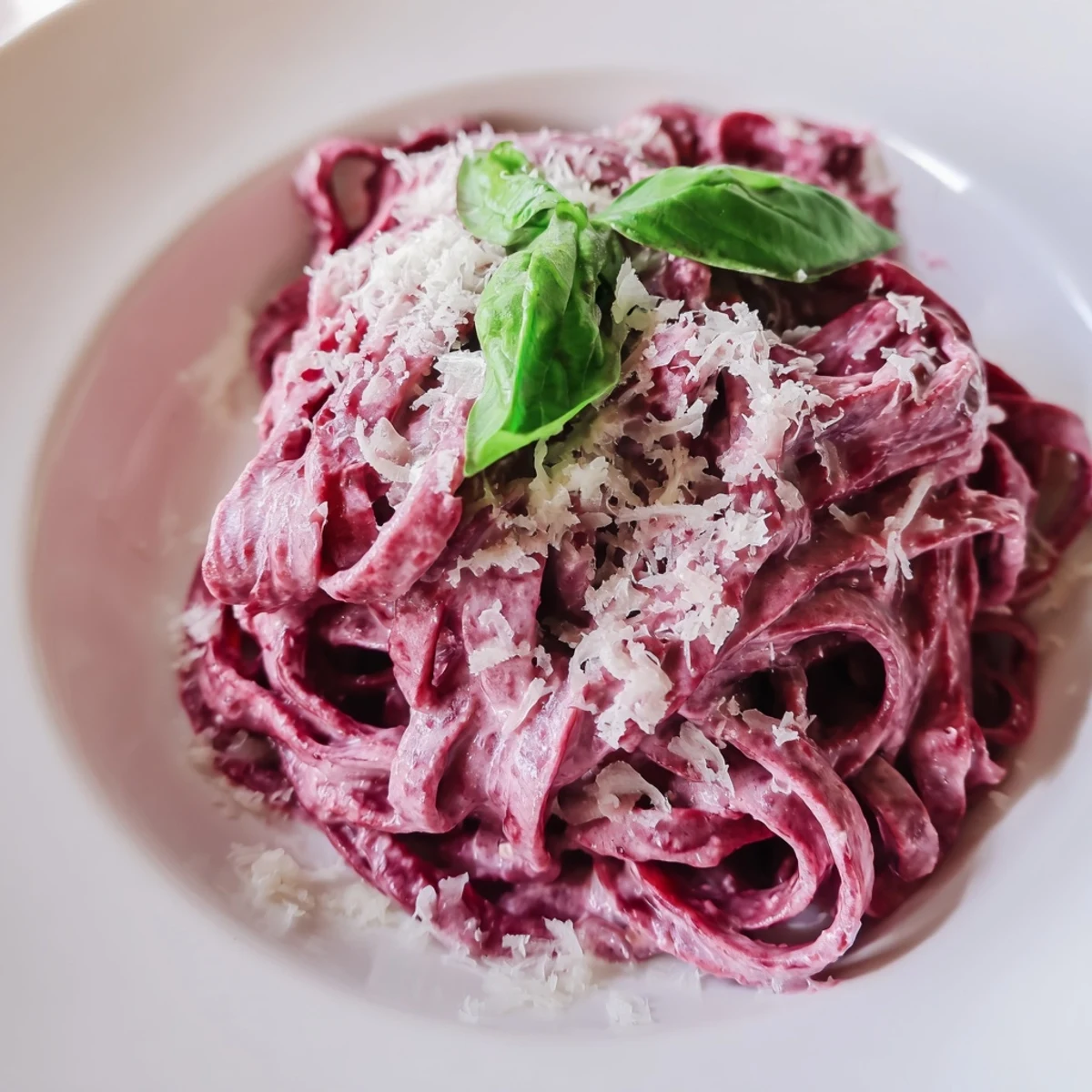 Close-up of Valentine Pink Pasta with Beet Sauce highlighting its smooth texture and pink color.