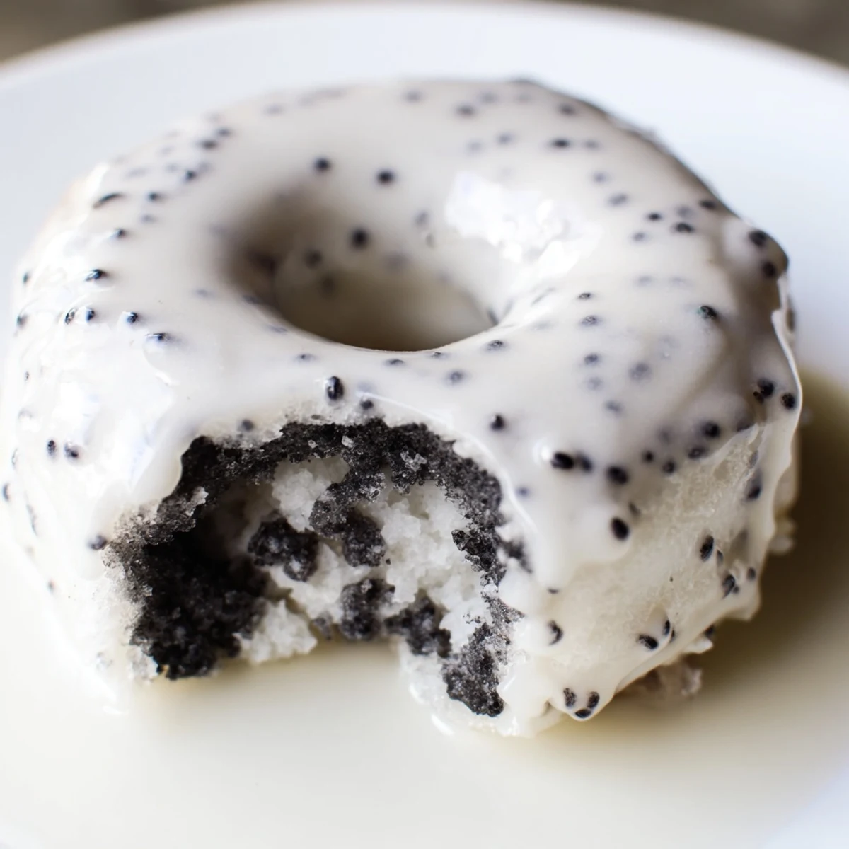 Gluten-free Black Sesame Mochi Donuts cooling on a wire rack, revealing a tender, mochi-like texture and nutty aroma.