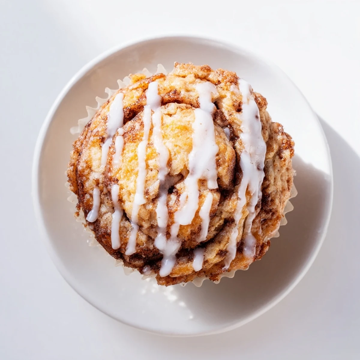 Fluffy high-protein muffins with swirling cinnamon layers baked in a muffin tin