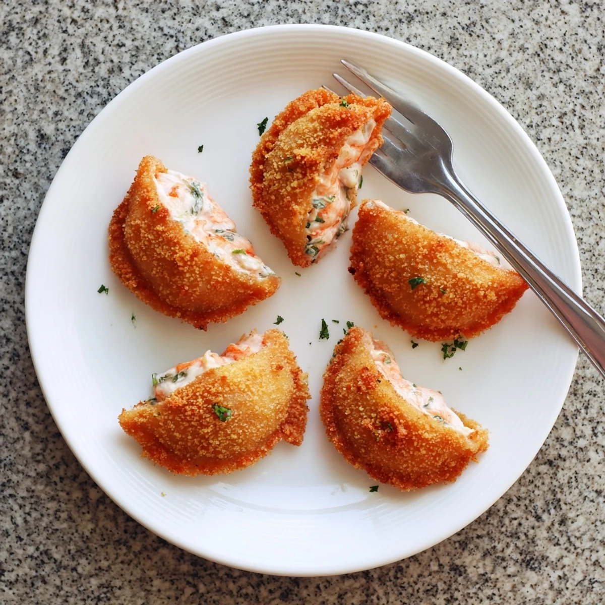 Portuguese shrimp rissois arranged on serving platter showcasing crispy exterior and delicate shrimp béchamel center