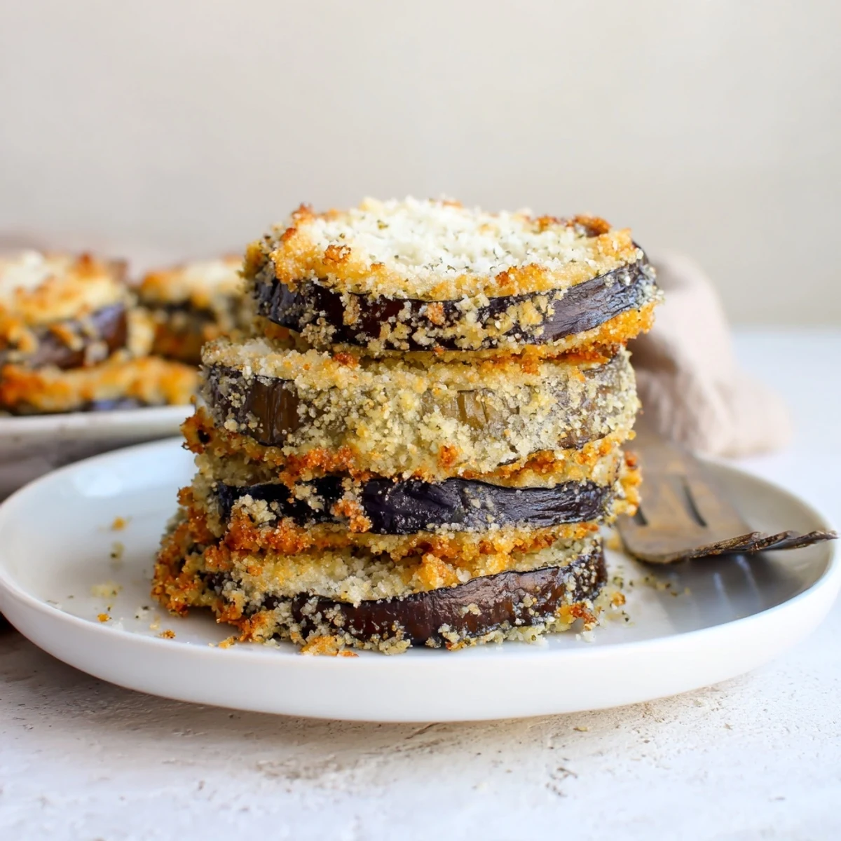 Crispy Baked Eggplant slices golden and crunchy, served with warm marinara.